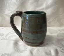 Load image into Gallery viewer, A Mug: (Desert Sage Greenish-Brown with a Leaf Thumb Rest) White Bottom