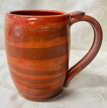 Load image into Gallery viewer, A Mug: (Peach Colored on Tri-Colored Clay with a Spiral Thumb Rest)