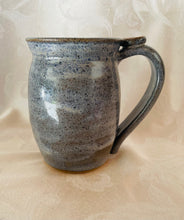 Load image into Gallery viewer, A Mug:  (Light Blue on Speckled Clay with a Flower Thumb Rest)
