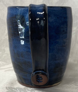A Mug:  (Azure Blue Ceramic Mug with a Leaf Stamp on the Handle Bottom)