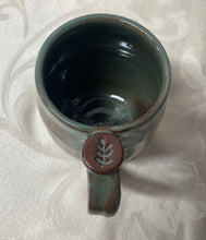 Load image into Gallery viewer, A Mug:  (Desert Sage Greenish-Brown with a Leaf Thumb Rest) White Bottom
