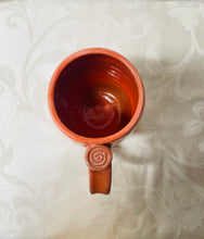 Load image into Gallery viewer, A Mug:  (Peach Colored on Tri-Colored Clay with a Spiral Thumb Rest)
